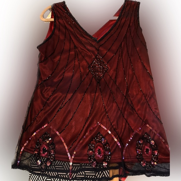 MARINA Tops - Marina burgundy top with sheer beaded material that flows with shirt NWOT